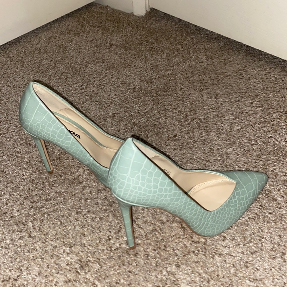 Light green beautiful heels. They're brand new